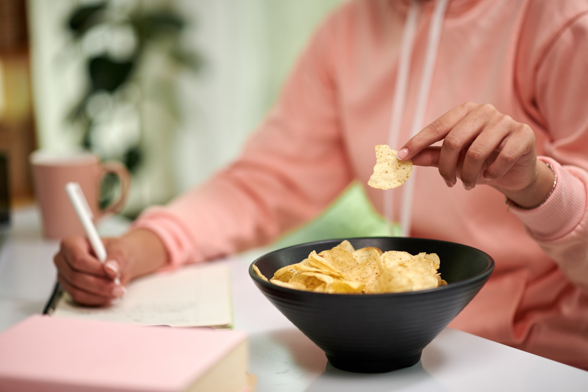 Student Eating Potato Chips